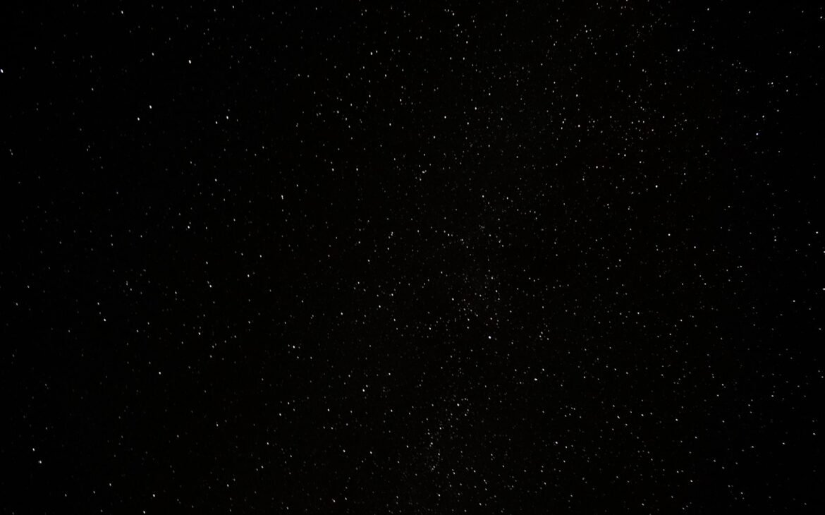 a black sky with a lot of stars